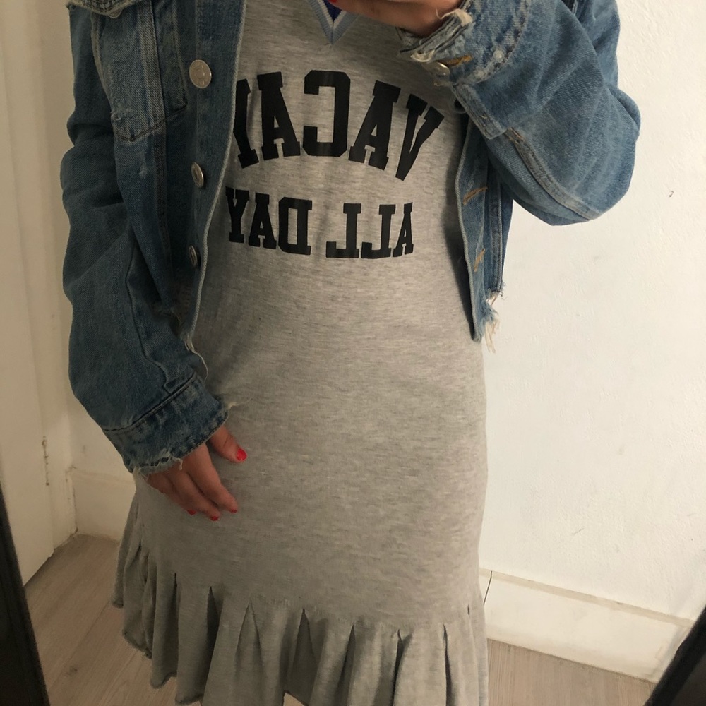 A summery dress written on it vacay all day